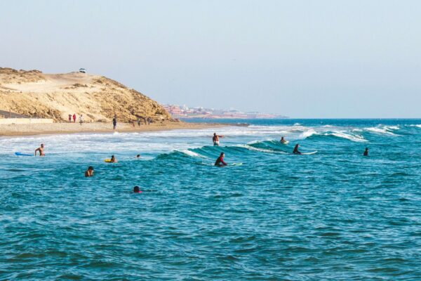 people surfing atlantic ocean